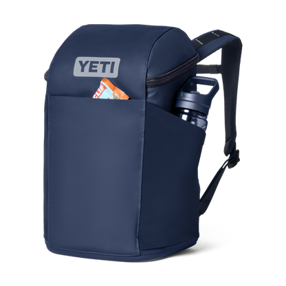 Navy blue backpack with YETI logo on a white background