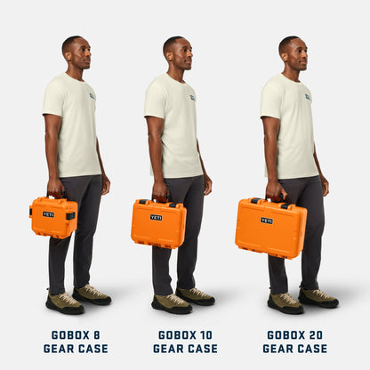 Three side-by-side views of a man wearing a light beige t-shirt and dark gray pants, each holding a different color of YETI gear case: orange Gobox 8, orange Gobox 10, and orange Gobox 20. The text at the bottom reads 'GOBOX 8 GEAR CASE', 'GOBOX 10 GEAR CASE', and 'GOBOX 20 GEAR CASE'.
